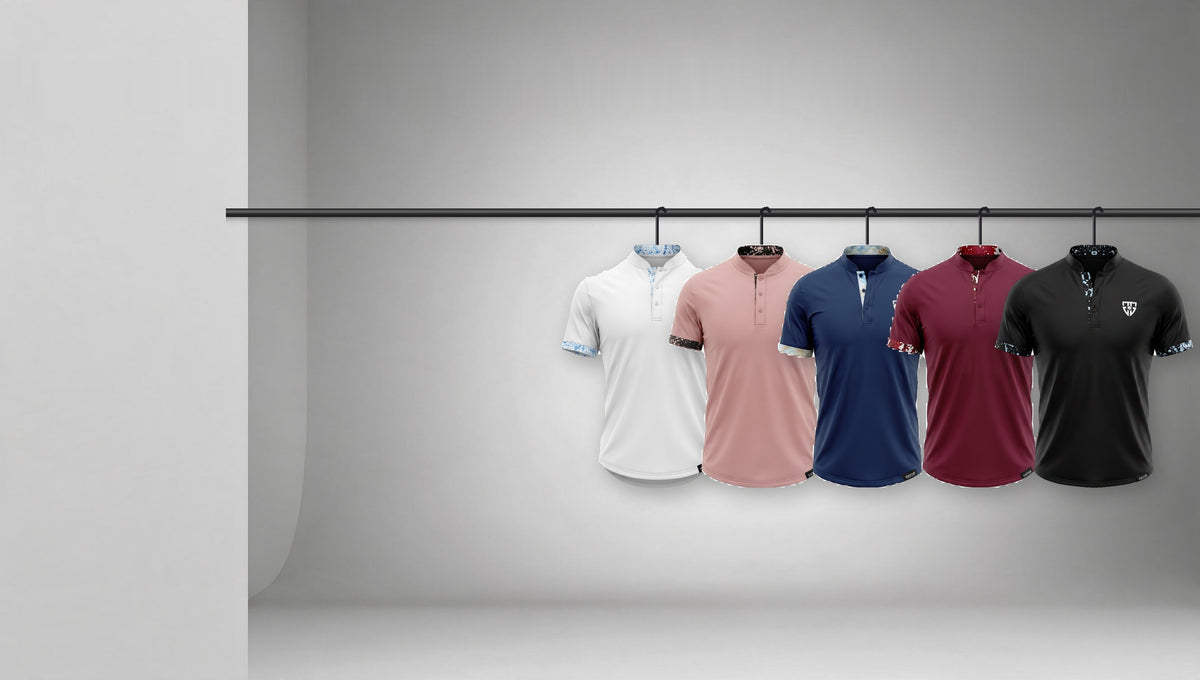Blade Collar Button Polo in five colourways hanging on a rail in a studio